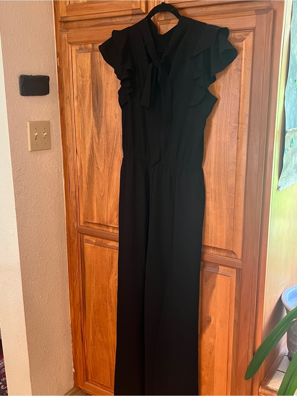 Black Ruffle Tie-Neck Jumpsuit